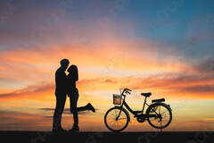 Silhouette of couple in love kissing in sunset Couple in - stock ...