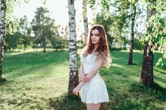 Girl In White Dress Outdoors